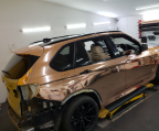 Rose gold chrome wrapped BMW X5